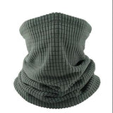 A gray ribbed knit balaclava face mask set shown on a white background, with a large front view featuring a flame graphic over the lower left, a smaller top-down view at upper right, and a folded view at lower right separated by a plus sign.
