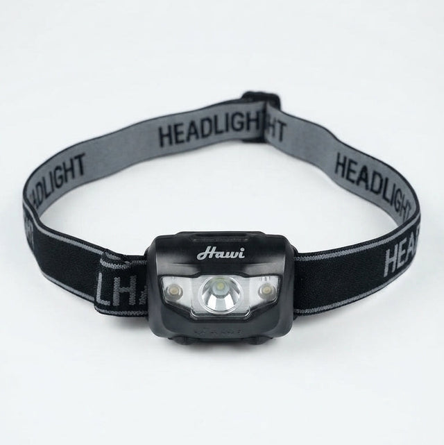 A black and gray headlight with an adjustable elastic strap, featuring the brand name 'Hauvi' printed on the front of the light housing and 'HEADLIGHT' repeated on the strap.